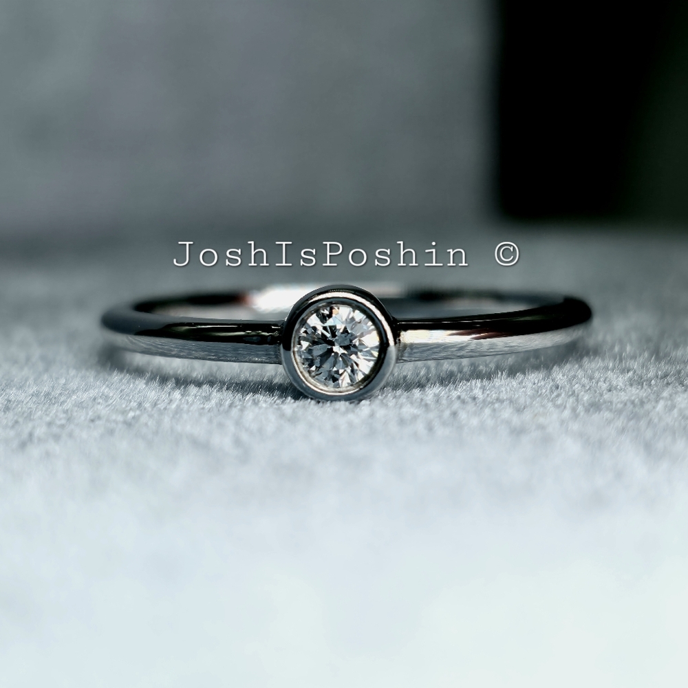 0.114CT Bezel set genuine diamond bezel set in sterling silver